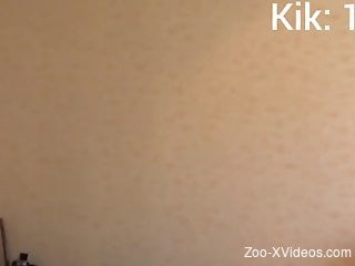 Dark-haired amateur zoophile getting plowed by a dog