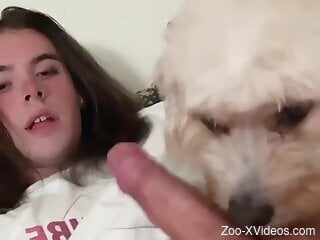 Amateur gay lad masturbates alongside his dog